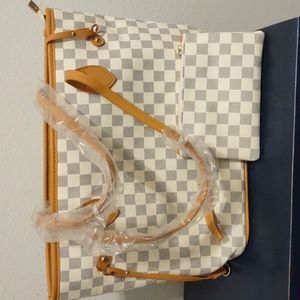 White and gray checkered handbag with small wristlet